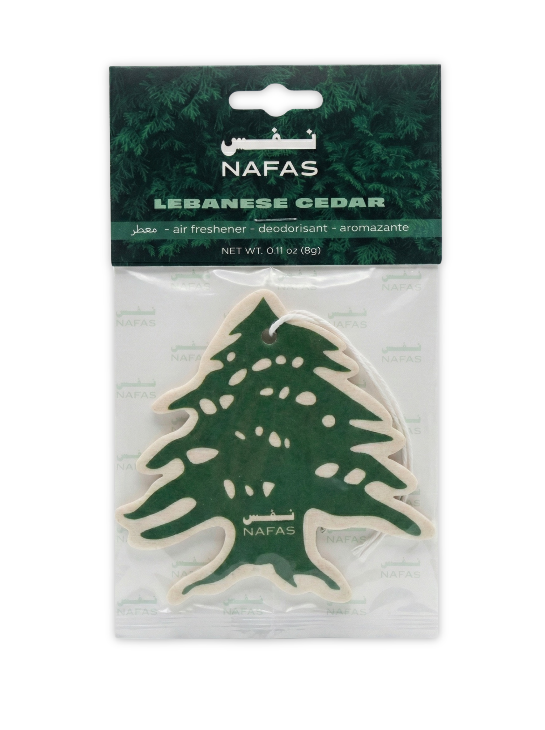 Lebanese cedar tree-shaped green Nafas scented paper air freshener on a white background with Lebanese Cedar.