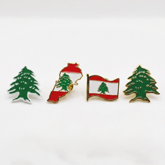Lebanese lapel pin collection with cedar tree, flag, and Lebanon map designs

