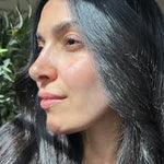 Side-profile portrait of a Nafas Lebanese Cedar team member outdoors in natural light