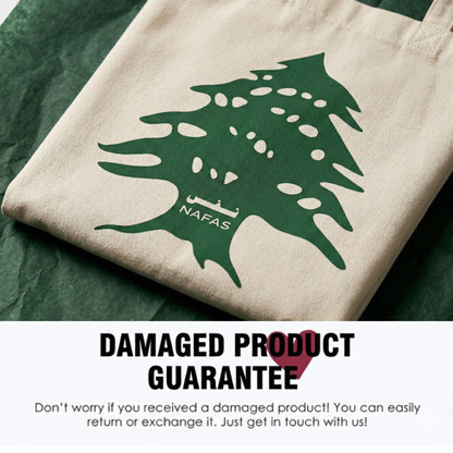 Close-up Lebanese Cedar print on Nafas cotton tote bag, with refund and return guarantee